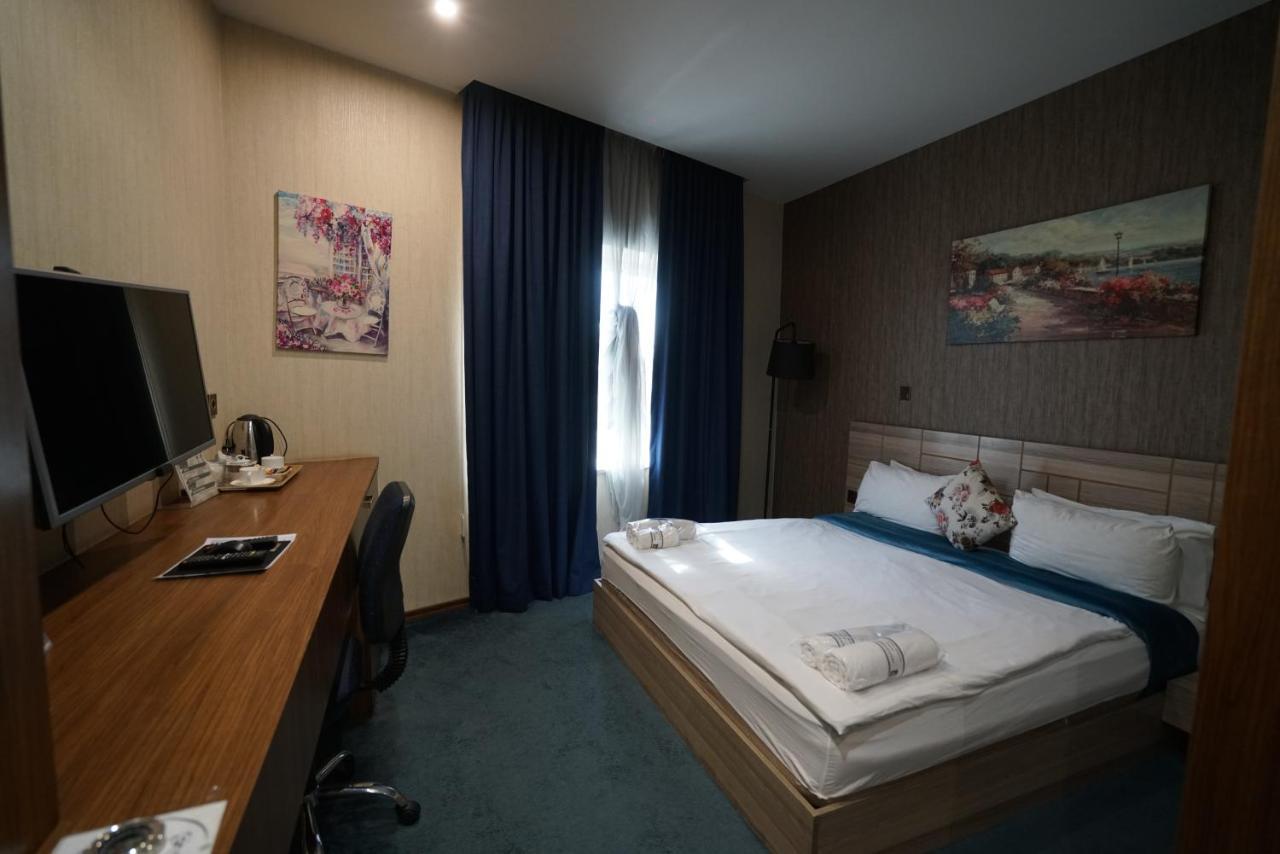 Gratus Hotel Erbil Bagian luar foto